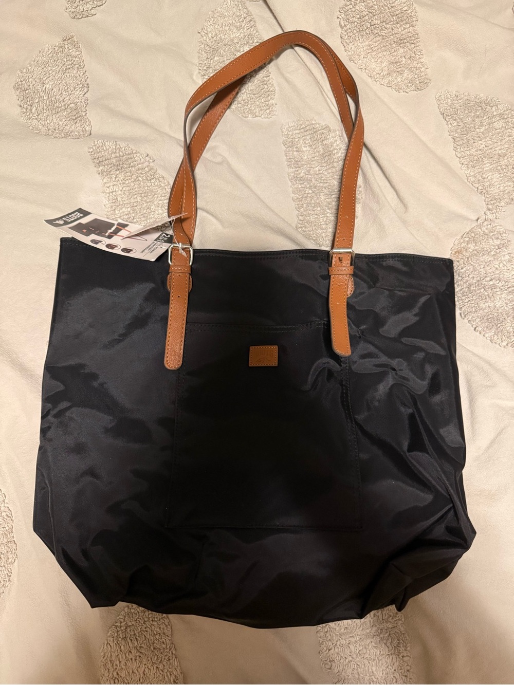 Roots Black Tote with Tan Straps